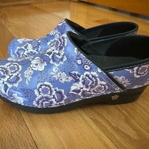 Sanita blue floral clog style- work. Barely used Small scratch mark(shown)